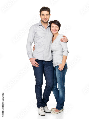 Photo: Full portrait of happy couple isolated on white Full portrait of happy couple isolated on white