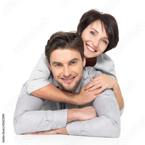 Photo: Portrait of happy couple isolated on white Portrait of happy couple isolated on white