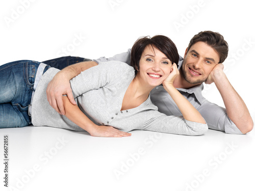 Photo: Portrait of happy couple isolated on white Portrait of happy couple isolated on white