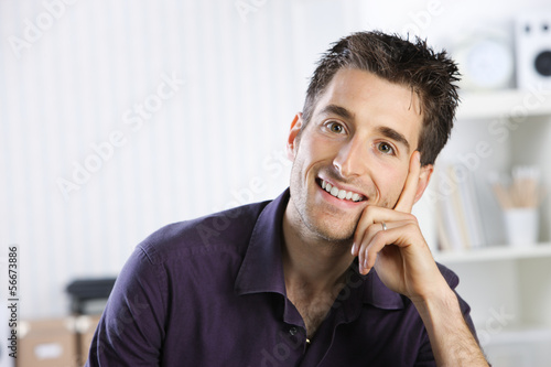 Photo: Young man smiling Young man smiling