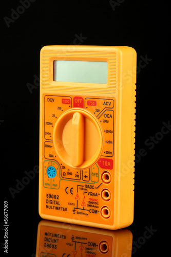 Photo: Multimeter on black background Multimeter on black background