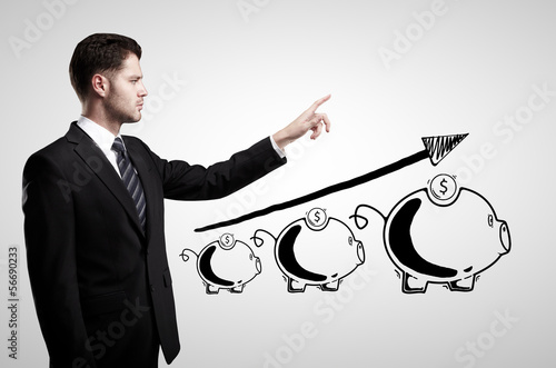 Photo: businessman and moneybox businessman and moneybox
