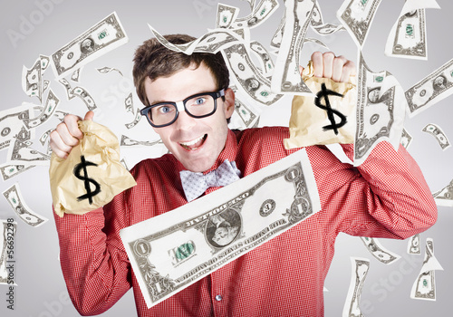 Photo: Happy accountant man in rain of falling money Happy accountant man in rain of falling money