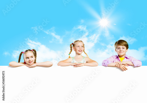 Photo: Kids with banner Kids with banner