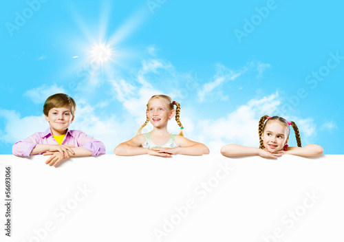 Photo: Kids with banner Kids with banner