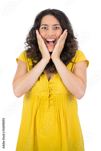 Photo: Astonished casual young woman posing Astonished casual young woman posing