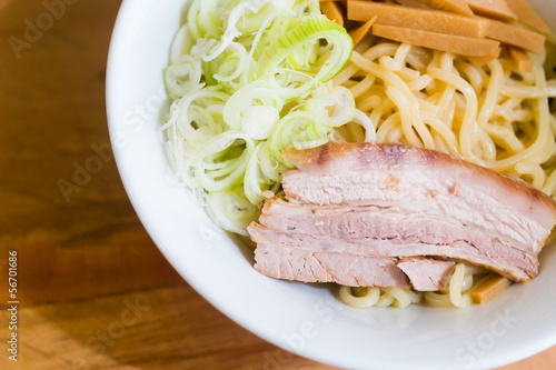 Photo: pork and onion sliceed on noodle in red bowl pork and onion sliceed on noodle in red bowl