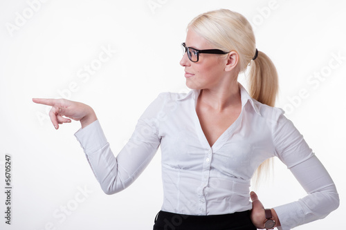 Photo: Businesswoman is showing something with her finger Businesswoman is showing something with her finger