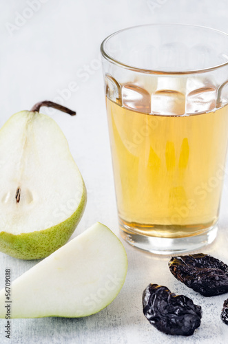 Photo: Healthy detox meal of apple juice, pear and prunes Healthy detox meal of apple juice, pear and prunes