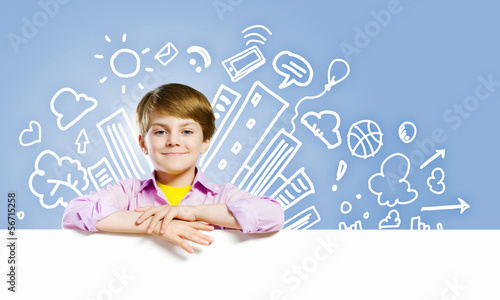 Photo: Cute boy with banner Cute boy with banner