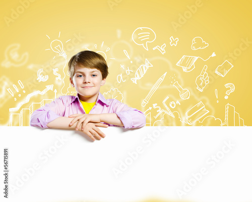 Photo: Cute boy with banner Cute boy with banner