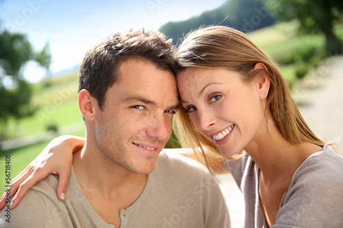 Photo: Sweet couple enjoying week-end in countryside Sweet couple enjoying week-end in countryside