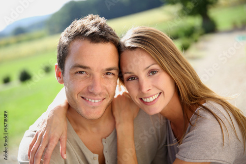 Photo: Sweet couple enjoying week-end in countryside Sweet couple enjoying week-end in countryside