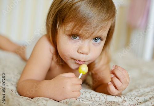 Photo: toddler with lollypop toddler with lollypop
