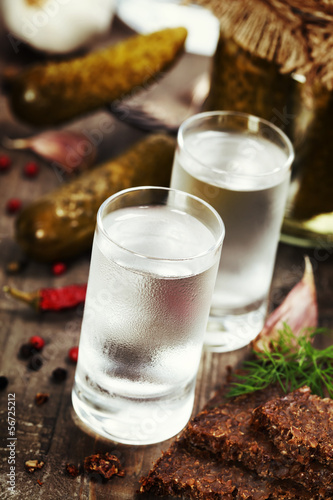 Photo: Russian vodka with traditional black bread and pickles Russian vodka with traditional black bread and pickles