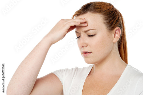Photo: Woman having severe headache Woman having severe headache