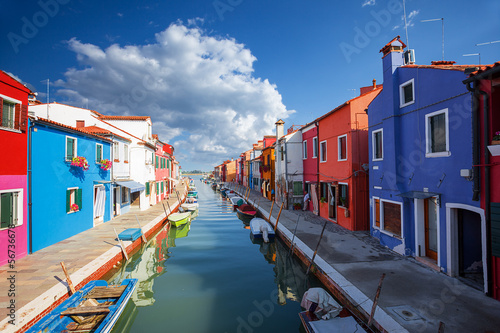 Photo: multicolored houses in Burano island. Venice. Italy. multicolored houses in Burano island. Venice. Italy.