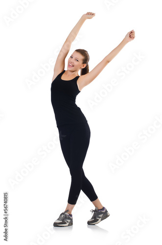 Photo: Young woman doing exercises on white Young woman doing exercises on white