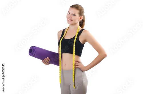Photo: Young girl with centimeter in dieting concept Young girl with centimeter in dieting concept