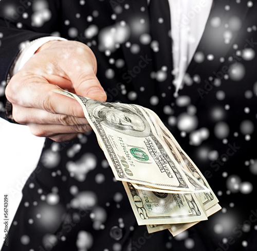 Photo: Businessman offering money Businessman offering money