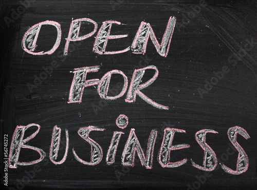 Photo: Open For Business sign on a Blackboard Open For Business sign on a Blackboard