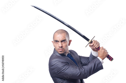 Photo: Businessman with sword isolated on white Businessman with sword isolated on white