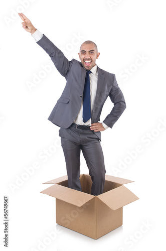 Photo: Businessman with box isolated on the white Businessman with box isolated on the white