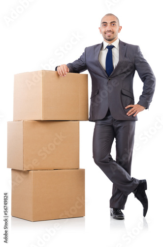 Photo: Businessman with box isolated on the white Businessman with box isolated on the white