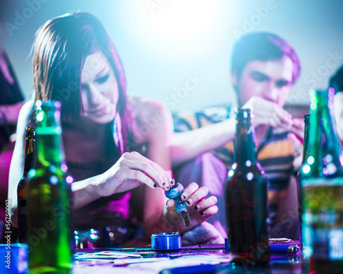 Photo: drug using teens at house party. drug using teens at house party.