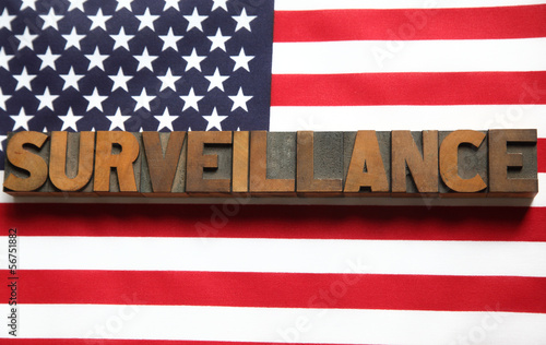 Photo: the word 'surveillance' on an American flag the word 'surveillance' on an American flag