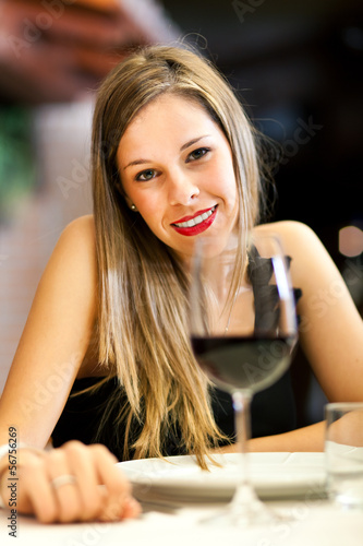 Photo: Beautiful woman at the restaurant Beautiful woman at the restaurant
