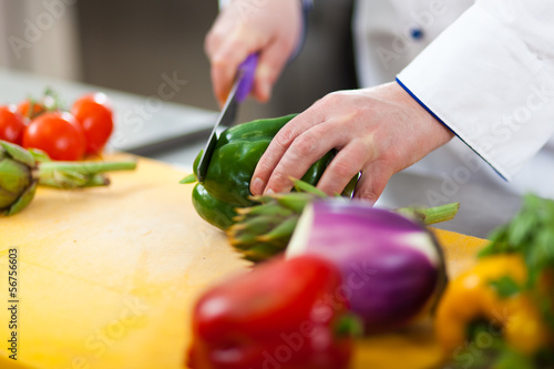 Photo: Chef cutting vegetables Chef cutting vegetables