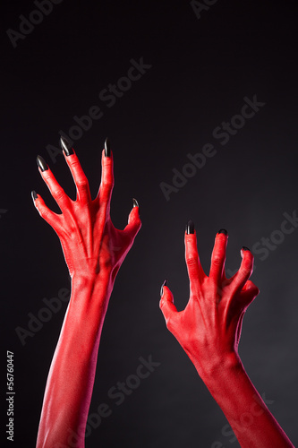 Photo: Red devil hands with black nails, real body-art Red devil hands with black nails, real body-art