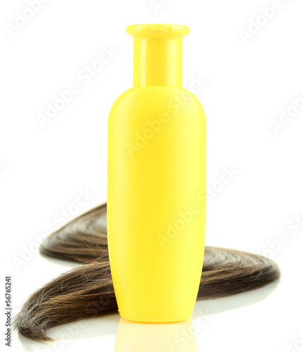 Photo: Shiny brown hair with shampoo isolated on white Shiny brown hair with shampoo isolated on white