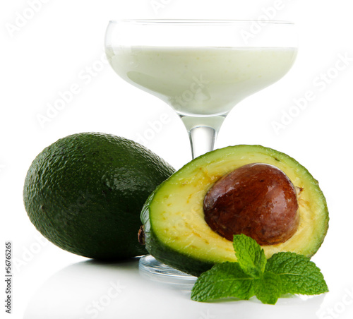 Photo: Fresh avocado smoothie isolated on white Fresh avocado smoothie isolated on white