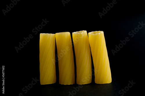 Photo: Pasta on black background Pasta on black background