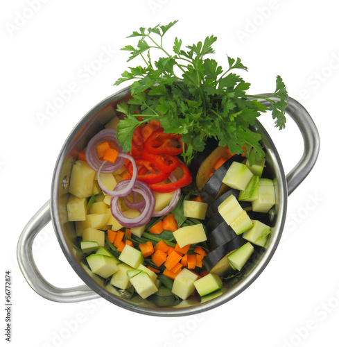 Photo: Fresh cut ingredients for vegetable soup in a pot Fresh cut ingredients for vegetable soup in a pot