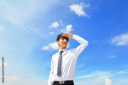 Photo: business man looking away to copy space business man looking away to copy space