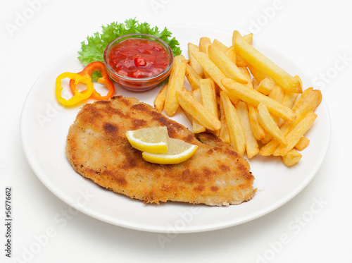 Photo: Schnitzel mit Pommes und Ketchup Schnitzel mit Pommes und Ketchup
