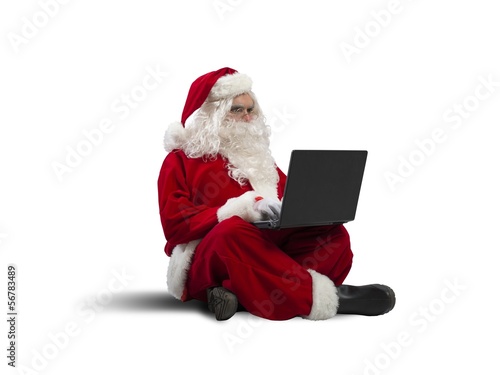 Photo: Santa Claus with laptop Santa Claus with laptop