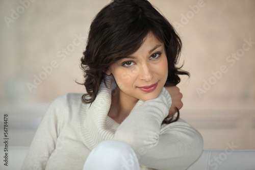 Photo: Brunette wearing a turtle-neck jumper Brunette wearing a turtle-neck jumper