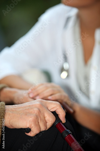 Photo: Elderly woman talking to a nurse Elderly woman talking to a nurse