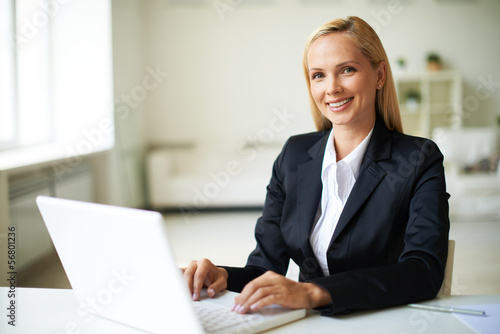 Photo: Businesswoman in office Businesswoman in office