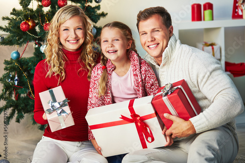 Photo: Family with gifts Family with gifts
