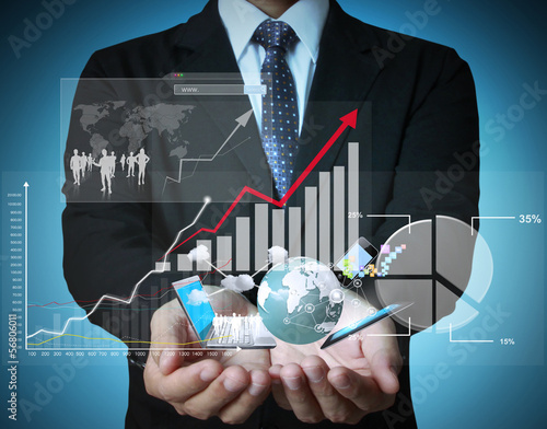 Photo: financial symbols coming from hand financial symbols coming from hand