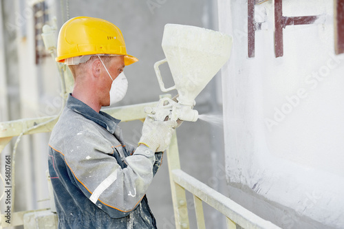 Photo: builder facade plasterer worker builder facade plasterer worker