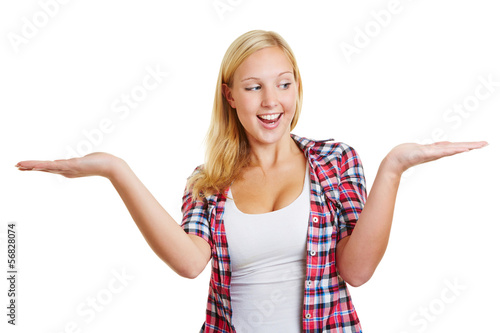 Photo: Woman holding both hands open Woman holding both hands open