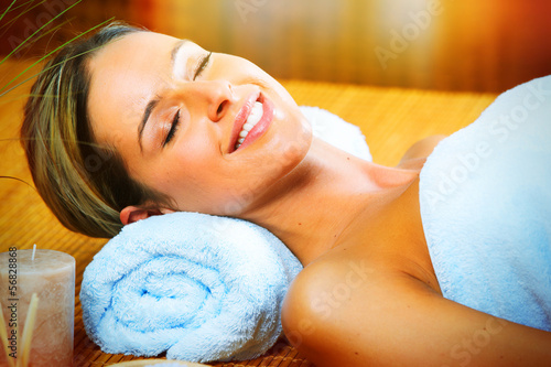 Photo: Beautiful woman having massage. Beautiful woman having massage.