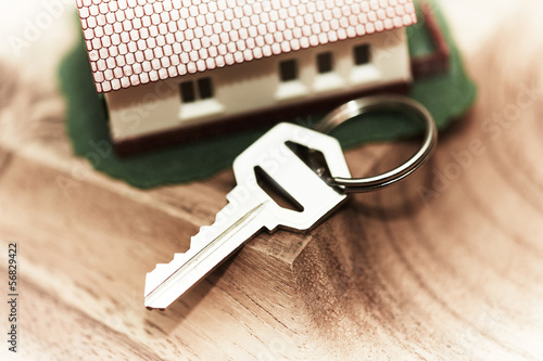 Photo: Family house and key. Family house and key.