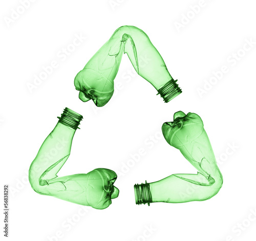 Photo: Concept of recycle. Empty used plastic bottle on white Concept of recycle. Empty used plastic bottle on white